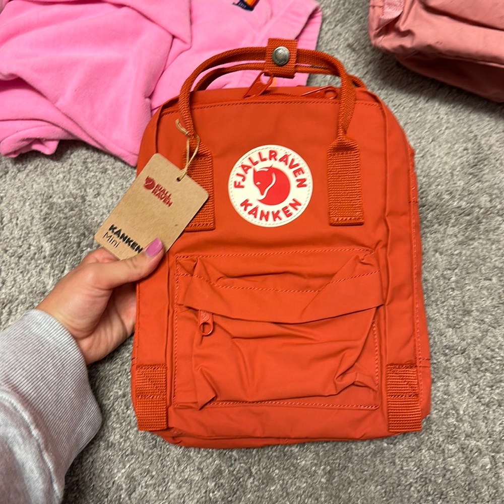 Mini red/orange fjallraven kanken backpack